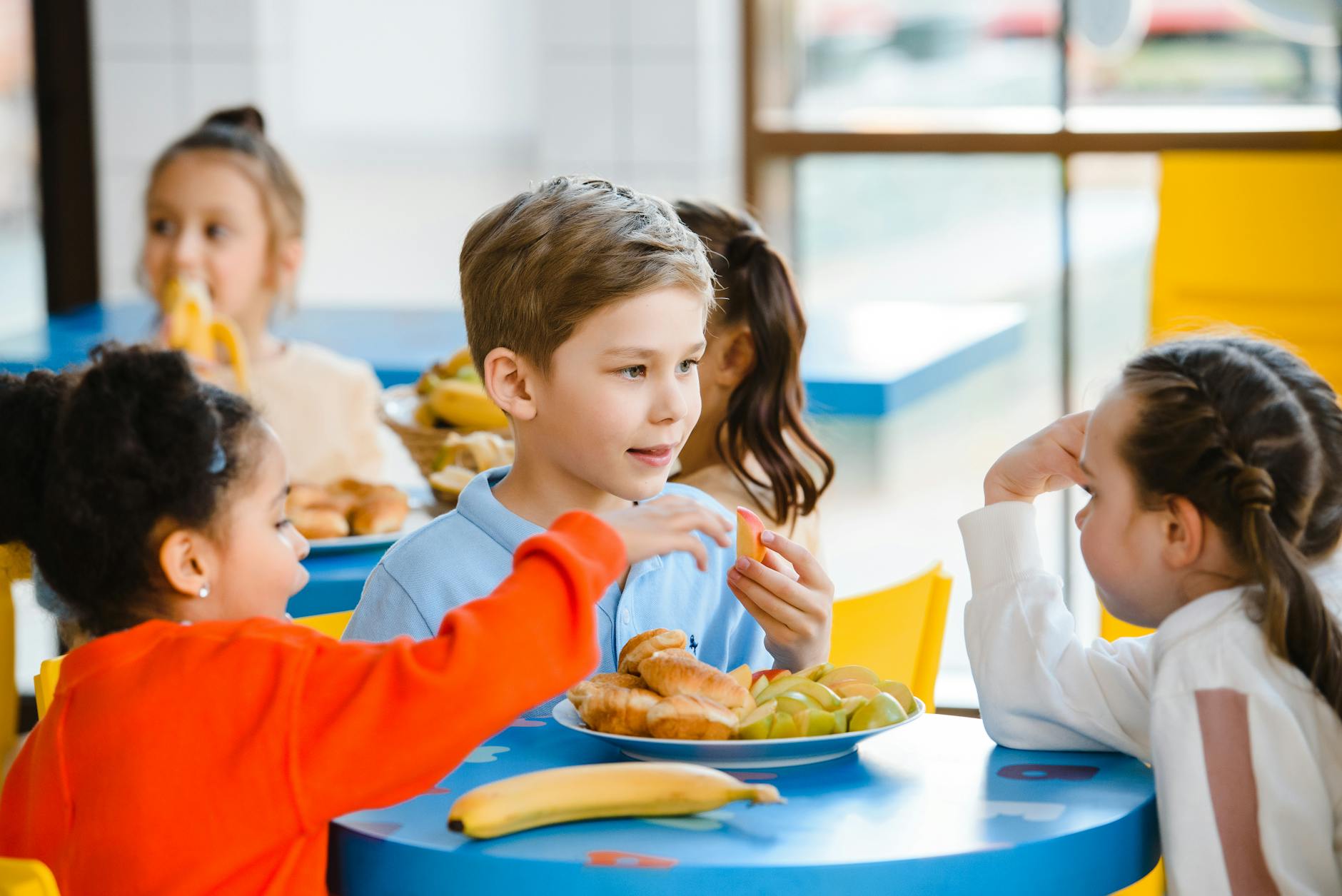 children eating together